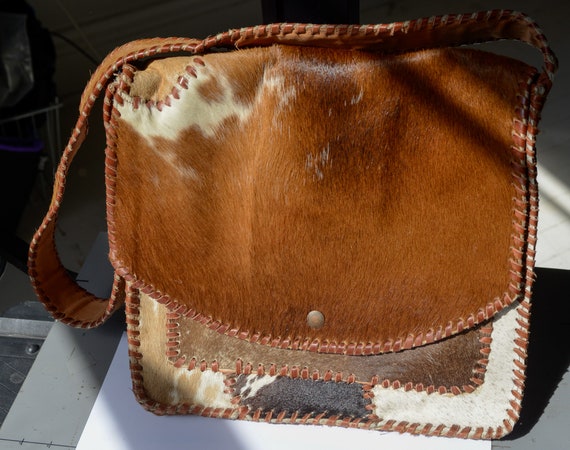 cowhide messenger bag