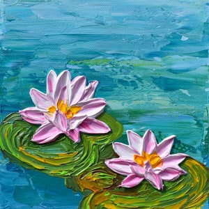 May include: Two pink water lilies with yellow centers bloom on green lily pads in a blue pond. The water lilies are painted in a textured style.