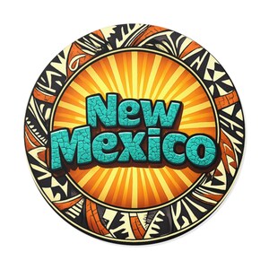 May include: A round, decorative item featuring the text "New Mexico" in turquoise, textured lettering. The text is set against a radiating orange sunburst design. The border has a black, white, and orange tribal pattern.
