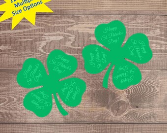 以下が含まれることがあります： 「Happy St. Patrick's Day!」という文字が書かれた緑色のクローバーの形をしたものが12個あります。