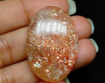 Cabochon ovale confettis en pierre de soleil – Pierres précieuses naturelles (37 x 25 x 7)