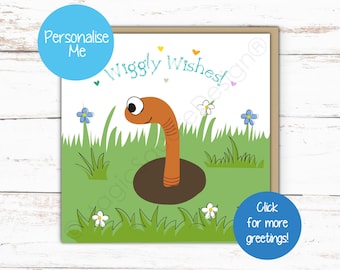 May include: A square greeting card featuring a cartoon illustration of a brown worm emerging from a dark brown hole in green grass. The text "Wiggly Wishes!" is printed in blue above the worm, surrounded by small colorful hearts and flowers.