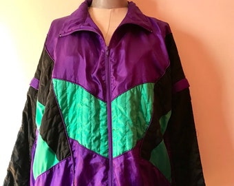 Veste de survêtement surdimensionnée des années 80 en violet, noir et vert vif, bloc de couleurs, survêtement unisexe. Manches amovibles et motifs géométriques sympas