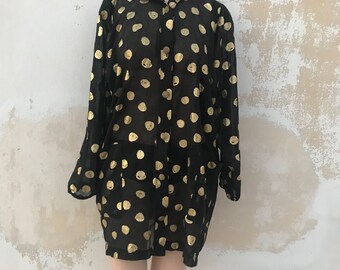 Abrigo largo transparente dorado/negro de los años 80 con botones, capucha y bolsillos, diseño de lunares.