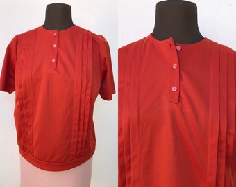 Burned orange 70s vintage, half buttoned, boxy fit blouse with side pleats