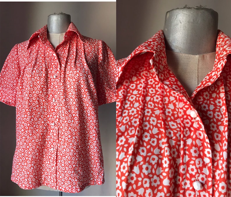 football shaped white buttons and white floral pattern 60s loose orange buttoned shirt with pointed collars