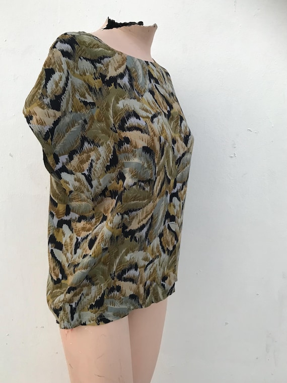 80s cool printed lightweight shirt with dolman sleeves that features abstract designs like painting leaves in olive green hues View 2