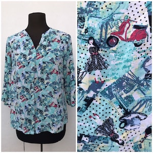 Red Vespa’s, girls with 50s outfits, coffee mugs, red sunglasses and polka dots. Super cool prints on this 80s shirt in green/turquoise hues