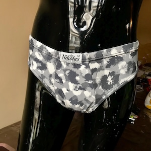 Watercolored kitschy cute, 80s vintage, all cotton men’s briefs in various hues of gray, brand new, found as a stock