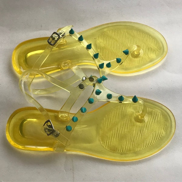Yellow fluroscent jelly sandals with contrasting conical turquoise studs, 90s vintage, unworn. Size Eur 37 /36.5 - Usa 7/6.5 - Uk 4.5/ 4
