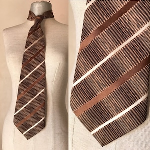 70&#39;s vintage with diagonal stripes necktie in brown and beige colors