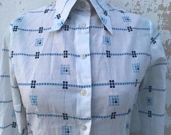 Pointed collared 70s vintage, white buttoned blouse with geometric pattern in blue and light blue made in Germany