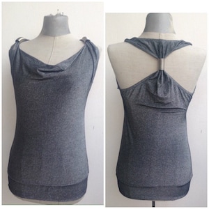 Glamorous silver/metallic draped neckline fitted blouse with impressive open back & metallic details