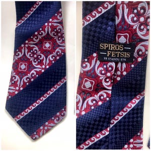 Groovy, bell bottom, trevira 70s vintage blue/red cravate features textured geometric designs