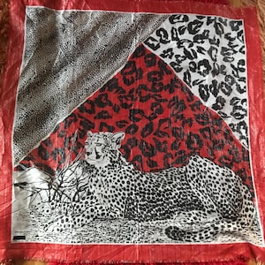 Animal printed glimpsy red/white big squared foulard with fringy edges. From the late 70s, in mint condition by Franco Laurenti