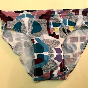Kitschy cute multicolored men’s 80s vintage cotton briefs featuring abstract/geometric prints. New old stock.