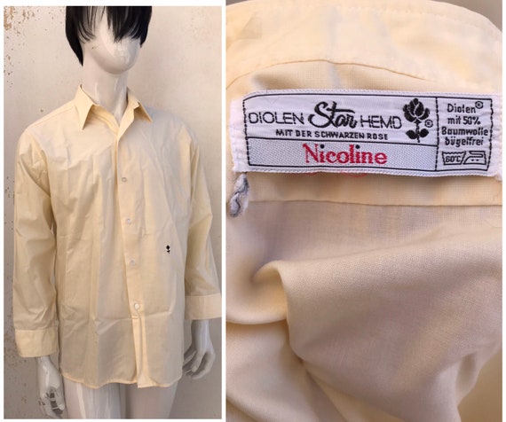beige color button up shirt