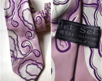 Psychedelic textured 70s vintage trevira necktie, features  swirl, paisley designs in pink hues, made in Greece