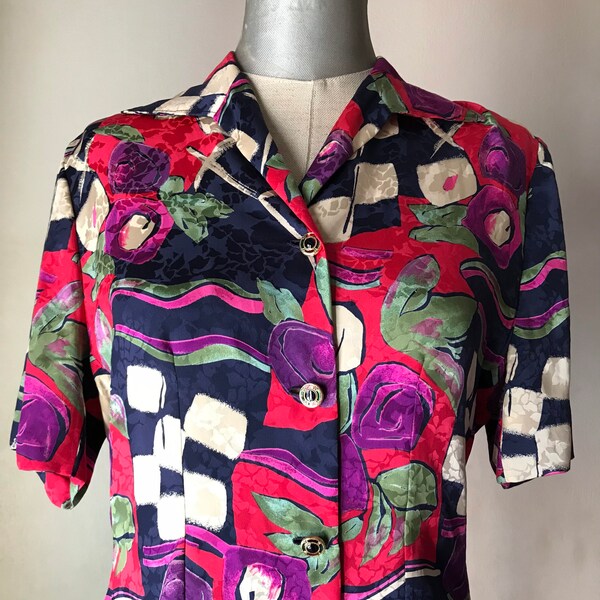 Colorful 80s buttoned blouse features roses, checkered and abstract mixed prints