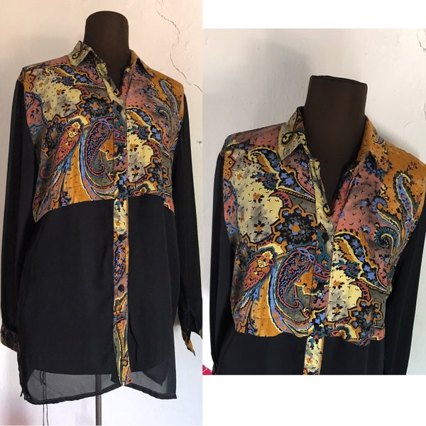 Half colorful paisley printed and half sheer contrasting buttoned shirt in the early 80s. Color block, novelty buttoned blouse