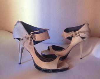 Beige & blue ankle strap high heel sandals with zip closure, and blue thick rubber sole
