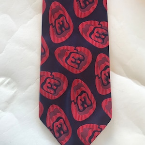 Red/black 70s vintage Trevira necktie features groovy, mod, novelty, rounded designs by Commodore