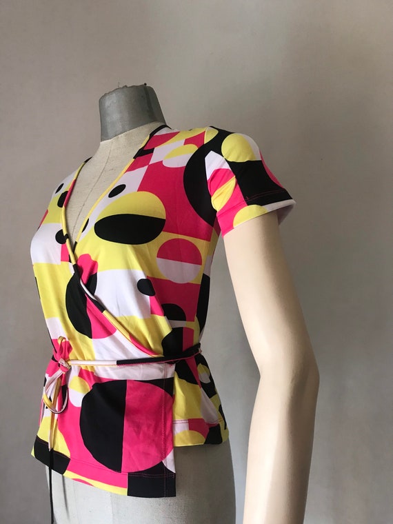 90s does 70s geometric colorful patterned stretchy