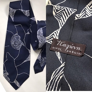 Rare, Silk, 60s vintage necktie, features abstract, drawings in dark blue and light beige by the luxurious Greek brand Pagoni
