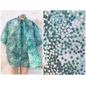 Bow tie 1970s vintage, loose buttoned polka dot shirt in various hues of green. XLarge