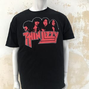 Thin Lizzy soft style T-shirt. Black T-shirt, official Thin Lizzy product from the early 00s. By Gildan