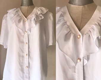 Ethereal 80s vintage white, sheer, romantic buttoned blouse with impressive big ruffled chevron shaped collars and puffy shoulders