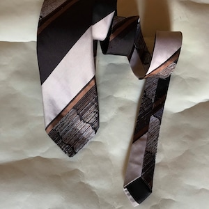 70's vintage, thick, textured, woven winter hipstericious brown necktie features striped & abstract designs