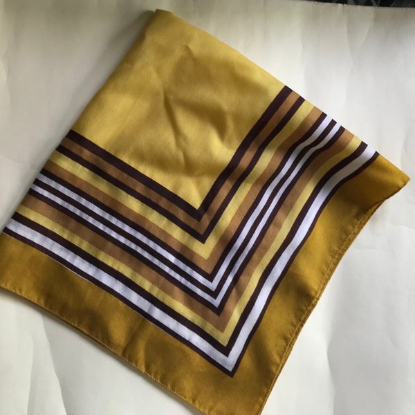 70s / 60s op art squared scarf featuring absolute, symmetrical square pattern in mustard yellow hues