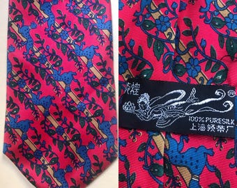 Blue panthers on red canvas silk, handmade excellent quality 1970s vintage necktie made in China