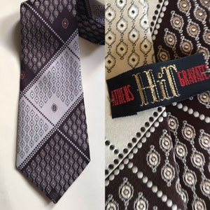Beige/brown 70s bell wide geometric/diagonal striped necktie made with Trevira fabric, in Athens, Greece