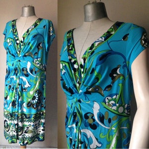 Turquoise and green floral 90s does 60s midi jersey dress with big bold floral prints, V neckline and draped bust & skirt