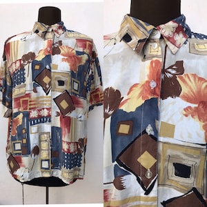 Geometric prints 80s loose short sleeved buttoned blouse with colorful abstract pattern in autumnal colors