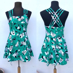 80s does 50s vintage green mini dress in A-line with impressive strappy back and crazy abstract pattern