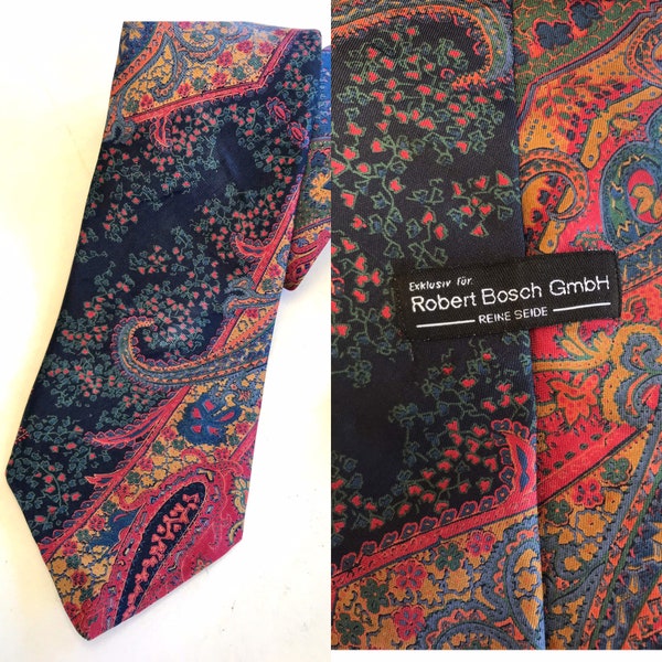 Paisley and floral patterned all silk made necktie, in various warm colors made in Germany by Robert Bosch