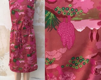 Pink 60's vintage straight line belted dress that features Japanese a like trees and nature. Novelty, cool 60's dress unused