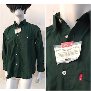 Camisa vintage Levi's de los años 80 para hombre en algodón verde ciprés, lisa, con dos bolsillos en el pecho y estilo western.