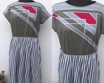80s new wave khaki wiggle dress featuring geometric designs on chest, side pockets & full, vertical striped skirt