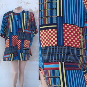op art printed 80s vintage XL, shoulder padded buttoned blouse features bright colors, polka dots and other geometric designs