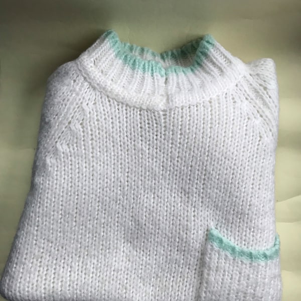 White 80s vintage chunky, slouchy sweater features mint green detaining on the pocket and the collars by Rouge by Helium