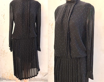 Amazing 70s/80 sheer ceremony black dress with sparkling blue polka dots & accordion skirt. Classy dress in Art Deco style by Gli Amuleti