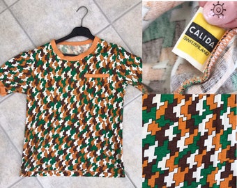 70s Calida Switzerland ringer T-shirt with puzzle/geometric pattern, chest pocket, in typical 70s colors: yellow mustard, brown & pine green