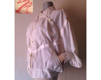 Iconic white linen unisex flax 80&#39;s jacket in loose bomber style. From the legendary Athenian rock shop REMEMBER