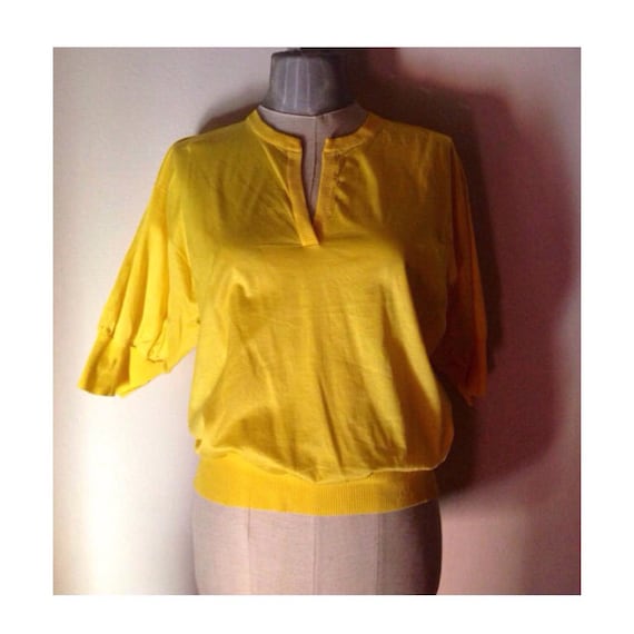 canary yellow blouse