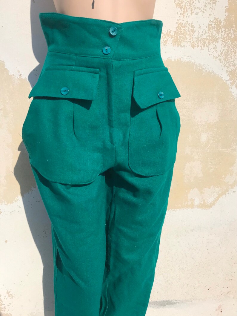 Coolest woolen 80s vintage high waisted tapered pants featuring multiple pockets in shamrock green color