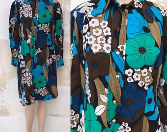 60's terry cloth half buttoned dress with bold, psychedelic floral designs in vibrant blue, brown, green colors & pointed collars